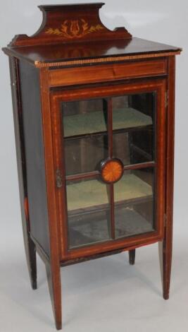 An Edwardian and mahogany and boxwood strung display cabinet