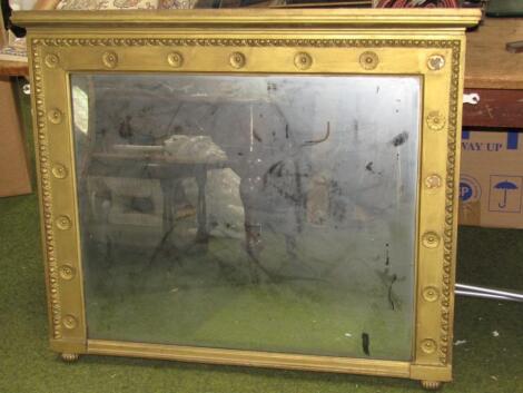 A late 19thC gilt wood over mantel mirror