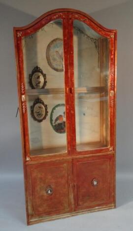 An oriental design stained cabinet