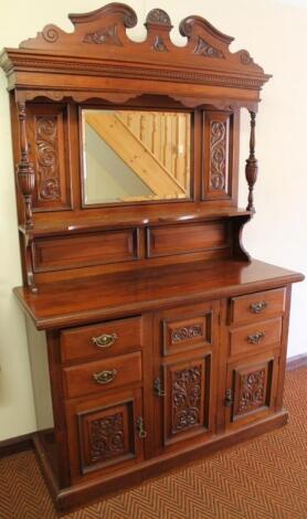 A late Victorian walnut mirror back dresser