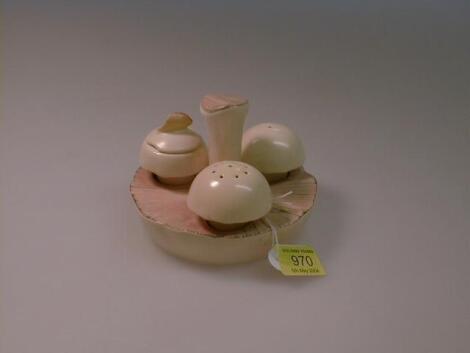 A Carltonware cruet as a flat mushroom stand with smaller mushrooms as