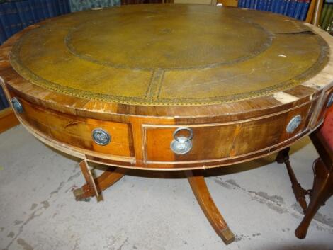 A 20thC Georgian style mahogany drum table