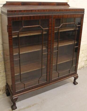 A mid-20thC mahogany display cabinet