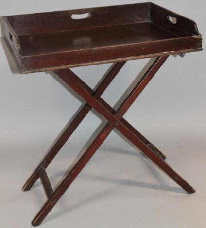 A 19thC mahogany butlers tray on stand