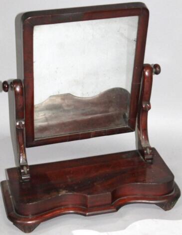 A Victorian mahogany table mirror