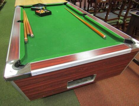 A modern coin operating pub pool table