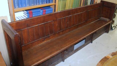 *A late 19thC stained pine church pew