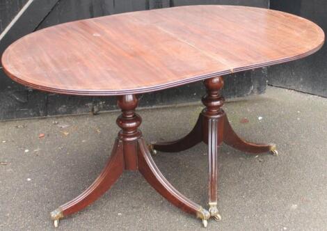 A 20thC mahogany D-end dining table