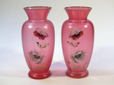 A pair of early 20thC Continental red glass vases