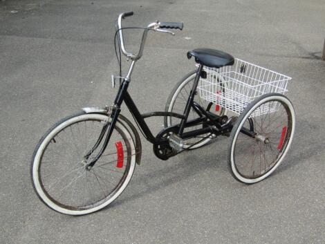 A modern metal framed tricycle