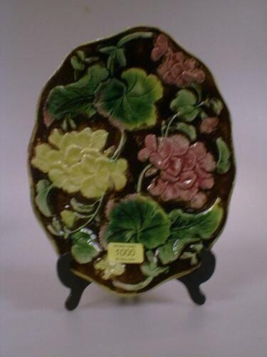 A Victorian Majolica strawberry dish moulded with floral decoration