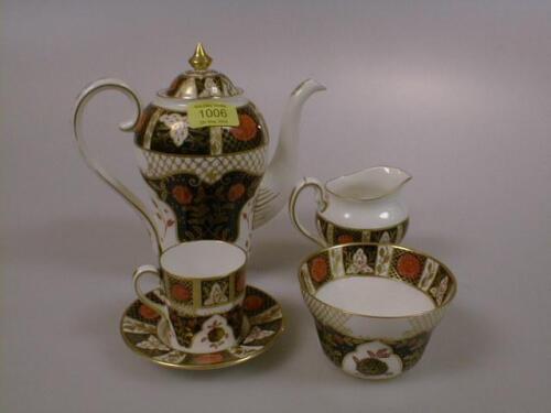 An Abbeydale (Derby) coffee service in the chrysanthemum pattern comprising 6 coffee cans