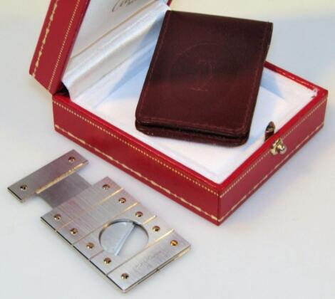 A 20thC Must de Cartier cigar cutter