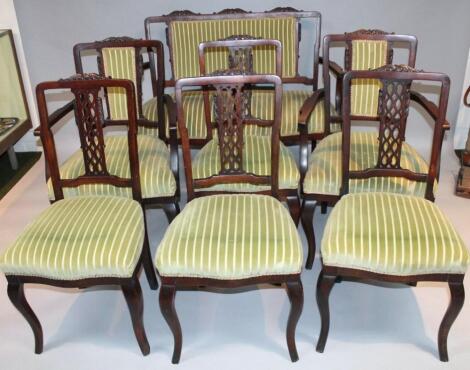 An Edwardian mahogany framed harlequin salon suite