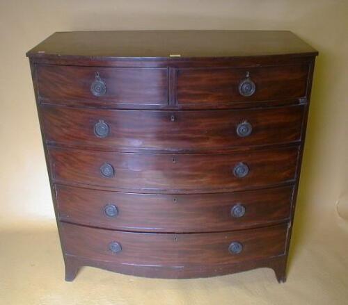 A Victorian mahogany bow front chest of two short and four long drawers