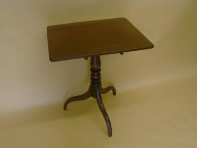 An early 19thC mahogany tilt-top tea table