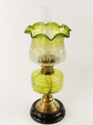 A Victorian brass oil lamp