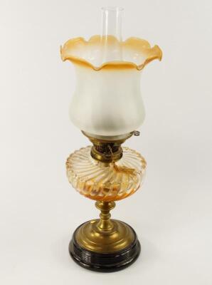 A Victorian brass oil lamp