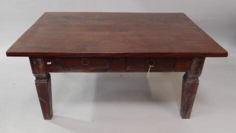 An Indonesian hardwood rectangular side table