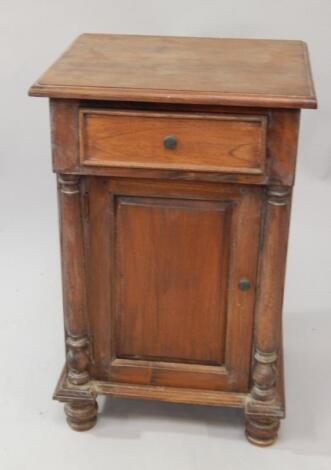 An Indonesian hardwood bedside pot cupboard