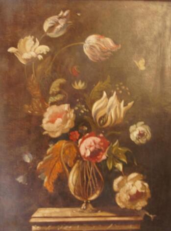 Roger Johnny. Still life study of mixed flowers in a vase on a ledge