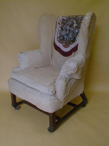 A 19thC George II style wing armchair