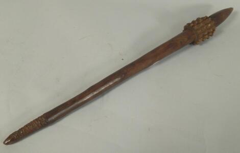 Tribal Art. A 19thC Aboriginal club with a pineapple shaped head and incised handle