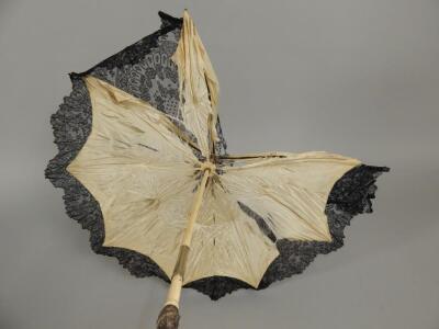 A late 19thC ivory and gilt metal parasol - 3