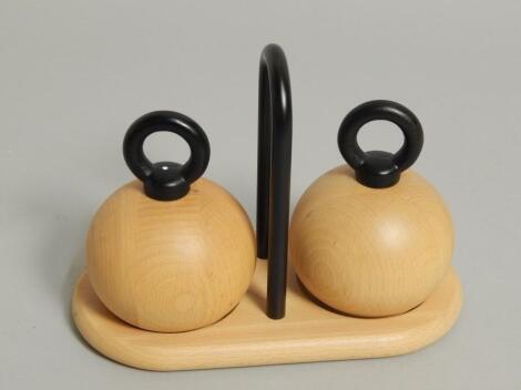 A Danish turned beech and ebonised 1970s cruet