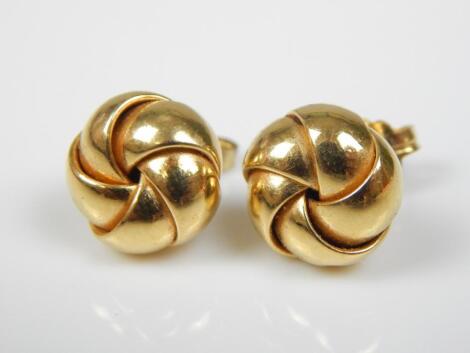 A pair of 18ct gold knot earrings