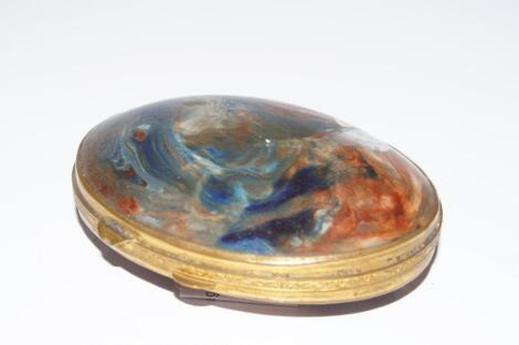 A marbled glass compact