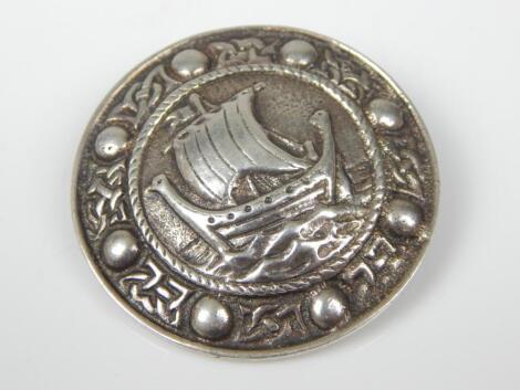 A silver Viking brooch