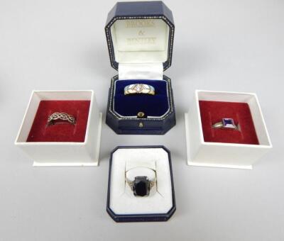 Four dress rings