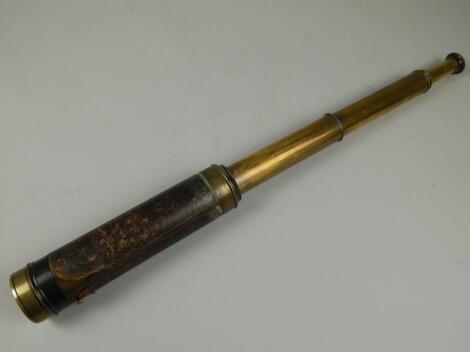 An early 20thC five drawer brass and leather telescope