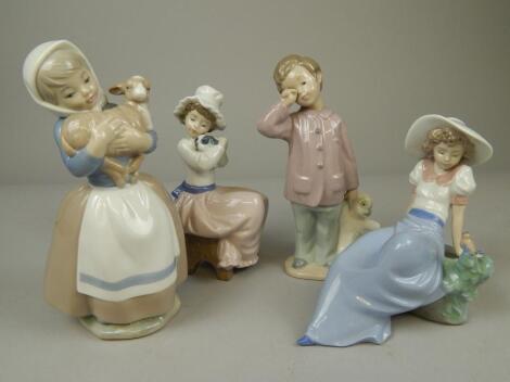 Four Nao Spanish porcelain figures