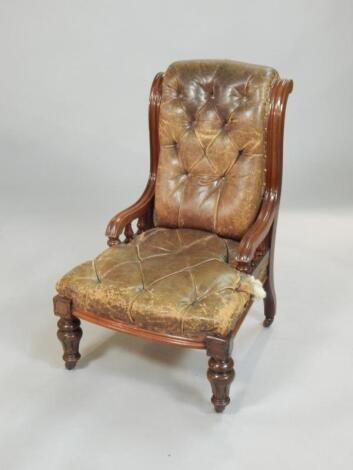 A Victorian walnut nursing type chair