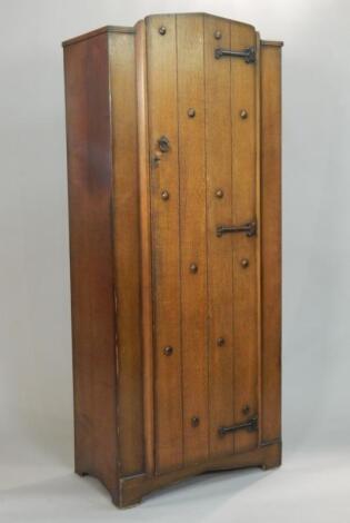 A small oak hall type wardrobe