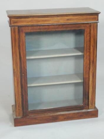 A Victorian walnut and boxwood strung pier cabinet