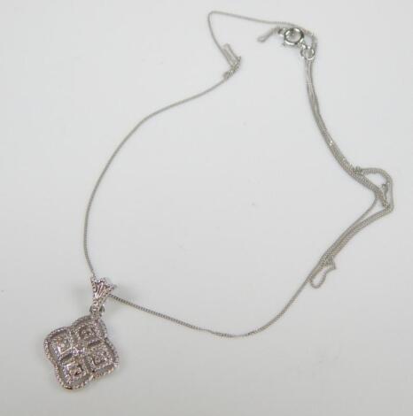 A 9ct white gold pendant and chain