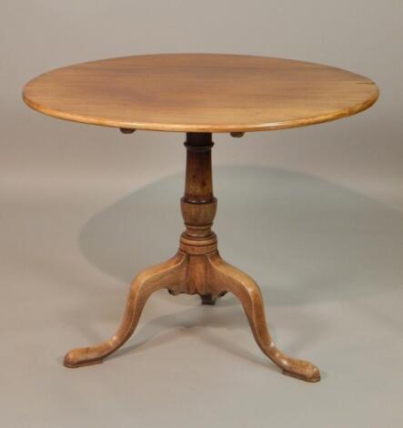 A George III mahogany tilt top table