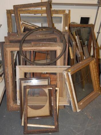 A large quantity of picture frames and mirrors.