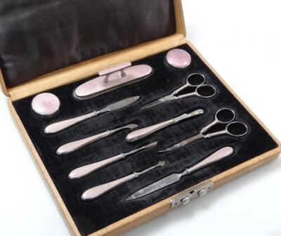 A mid-20thC pink enamel manicure set