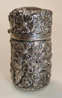 An Edwardian silver perfume bottle