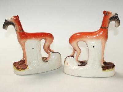 A pair of 19thC Staffordshire pottery greyhound figures - 2