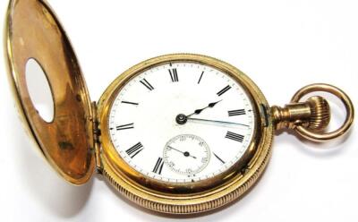 An early 20thC half hunter pocket watch