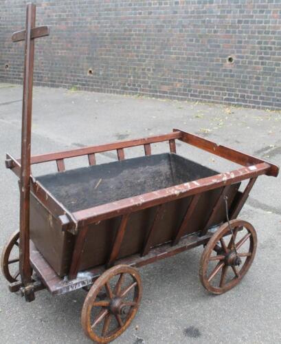 A 20thC rustic hardwood hay cart or bogie