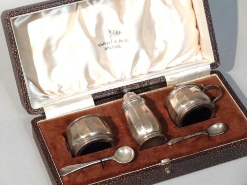 A George VI silver cased cruet set