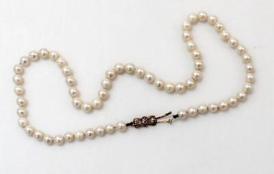 A string of uniform cultured pearls