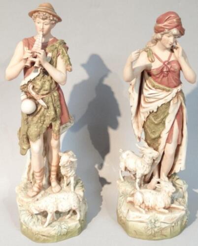 A pair of early 20thC Royal Dux figures