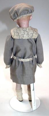 A late 19thC/ early 20thC bisque headed male doll - 2